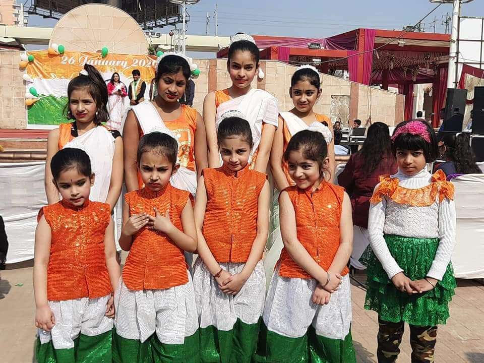 many girls in flag colour clothes